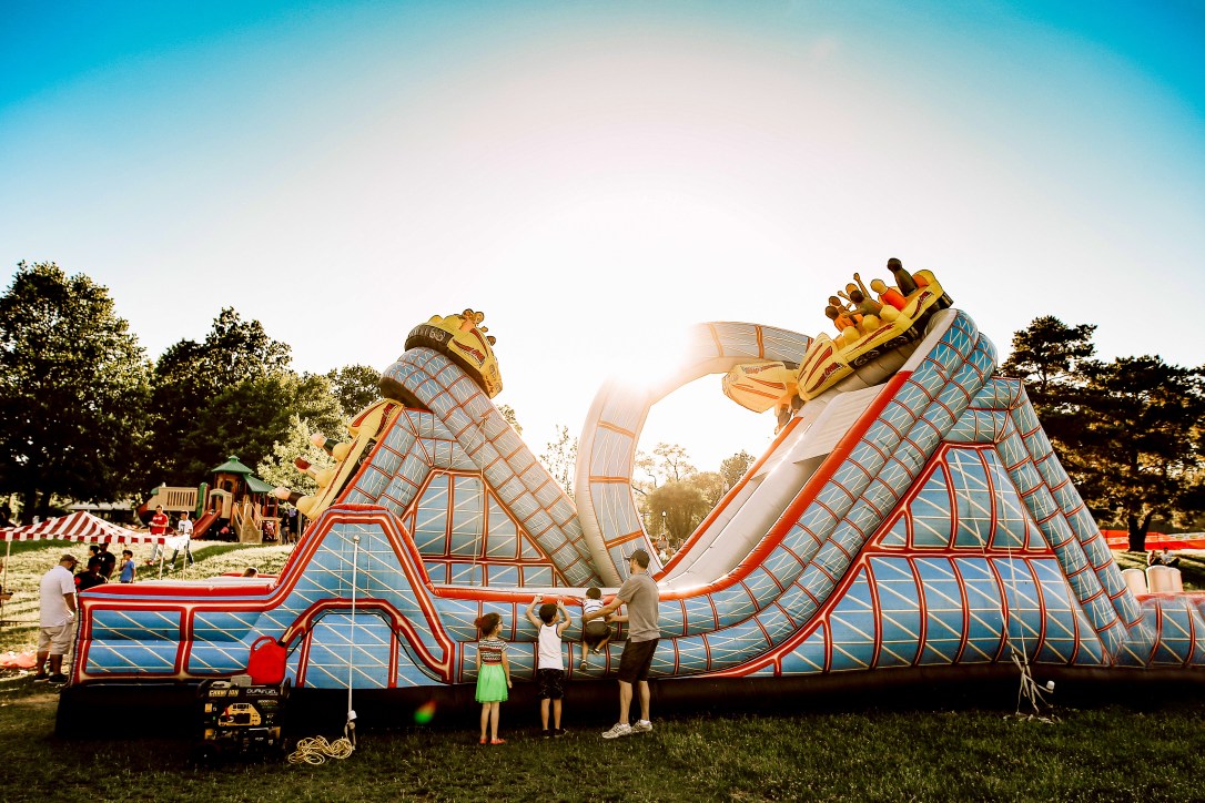 Inflatable ride carnival kids family sunset