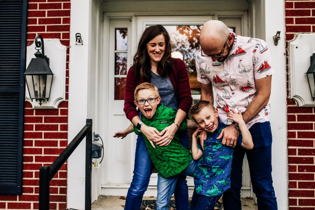 family photography at home session porch laughing