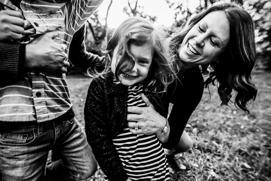 family photography laughter tickle snuggle mom daughter