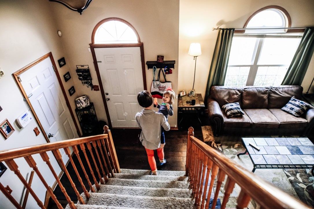 family photography at home session bubbles mother daughter toddler girl bubbles