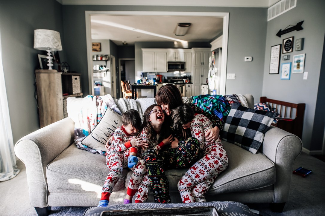 self portrait mom kids couch christmas pajamas